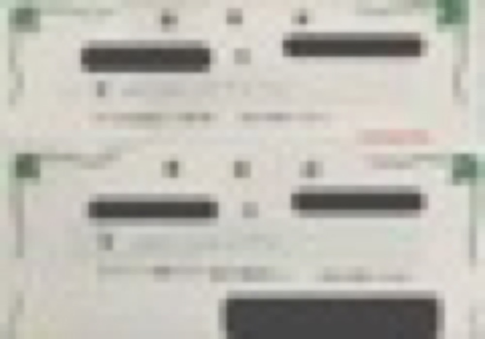 受領した領収書（モザイク処理済み）
