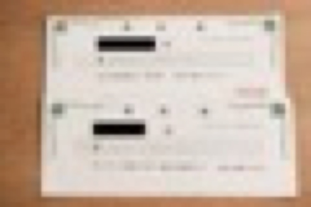 受領した領収書（モザイク処理済み）