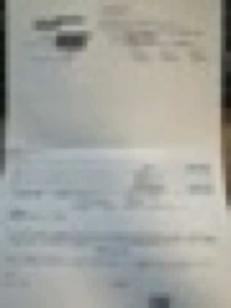 受領した領収書（モザイク処理済み）